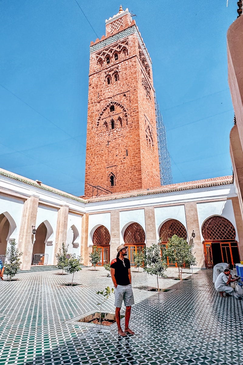 Local guide explaining history in Marrakech medina
